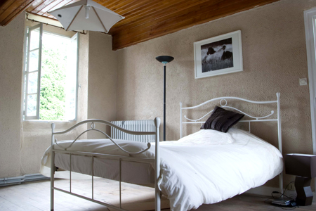 Large double bedroom with en-suite bathroom, possible to add additional single beds if required.